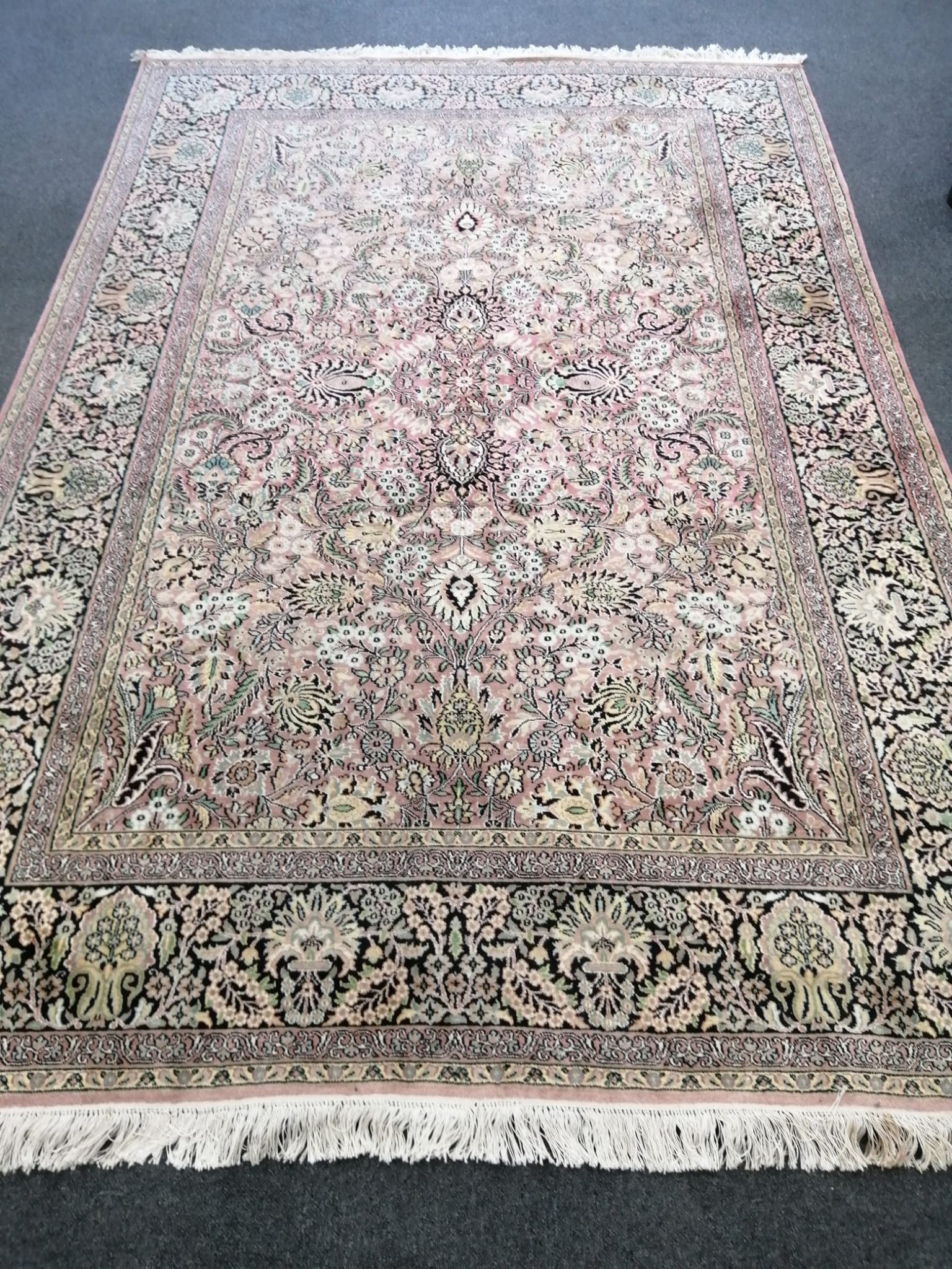 A mid 20th century North West Persian pink ground carpet, 280 x 186cm